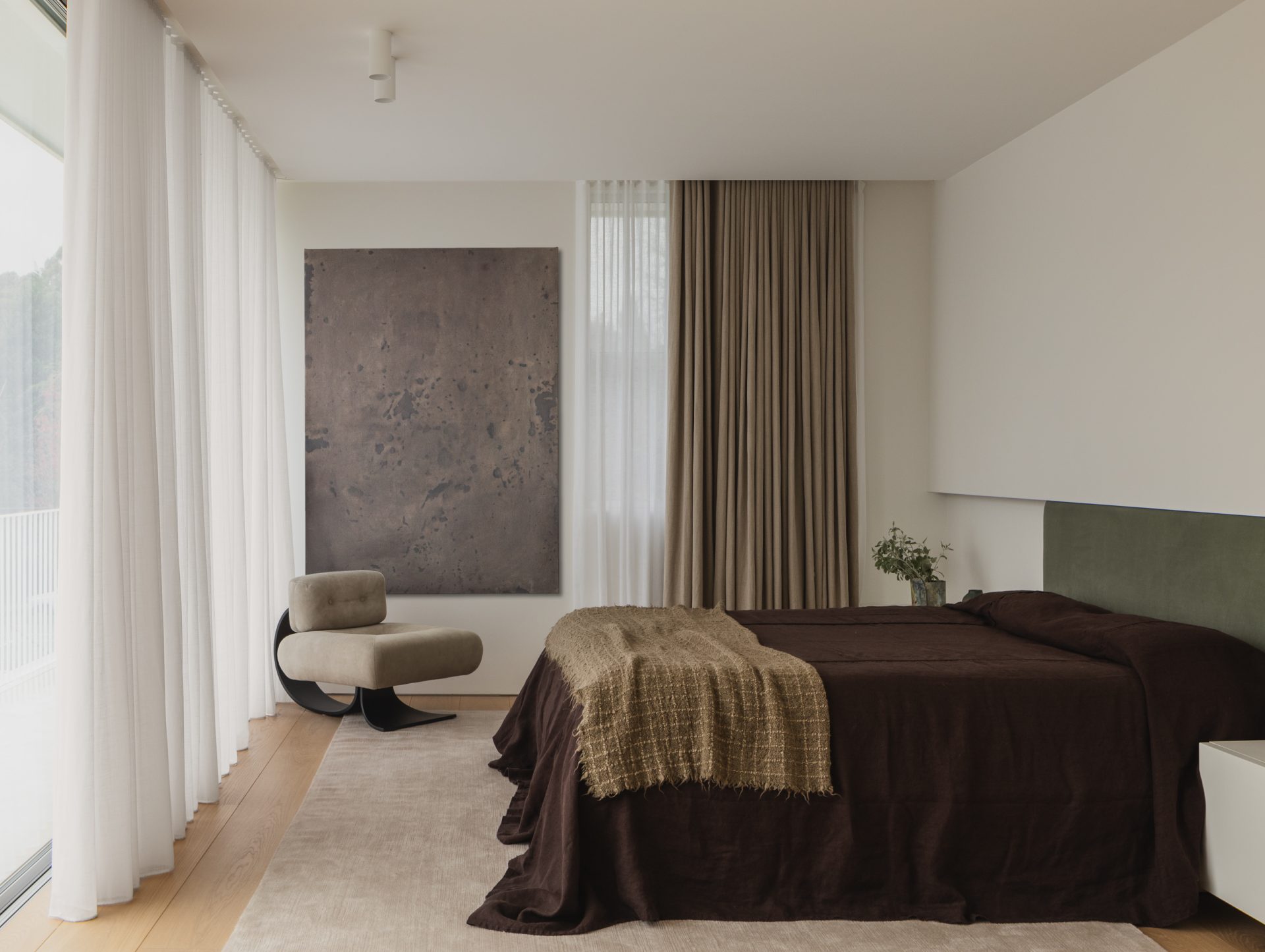 Bedroom with curated artwork at Melody House